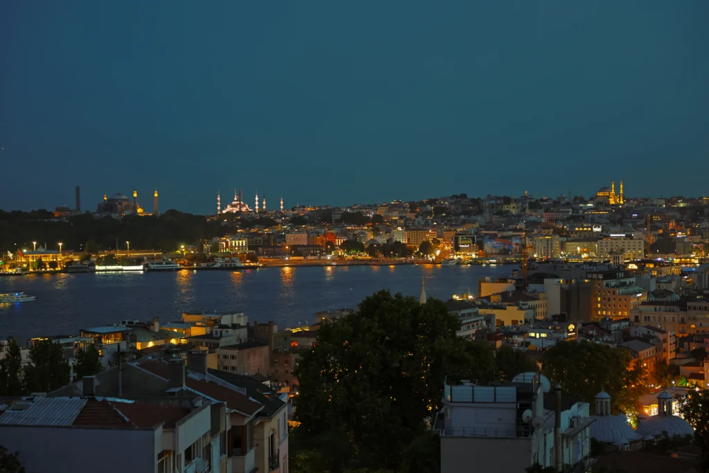 Istanbul skyline and Bosphorus at night seen from Arwin Roof in Beyoğlu